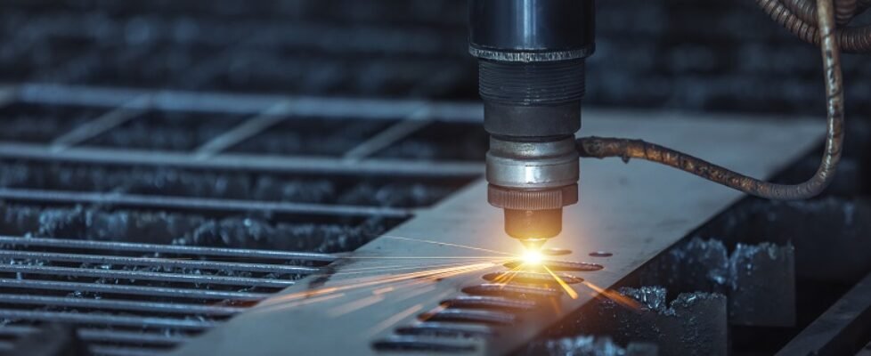 CNC Laser cutting of metal, modern industrial technology. Small