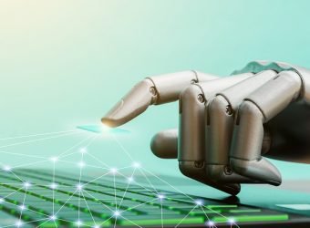 Robot concept or robot hand chatbot pressing computer keyboard enter