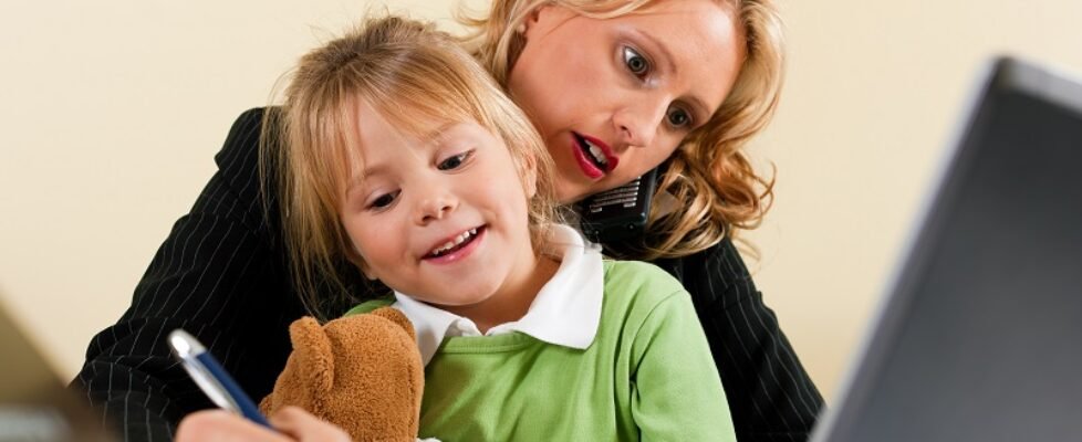 Businesswoman and mother is working at home