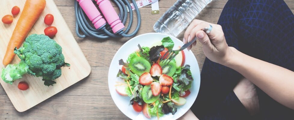 Yoga female cooking homemade salad