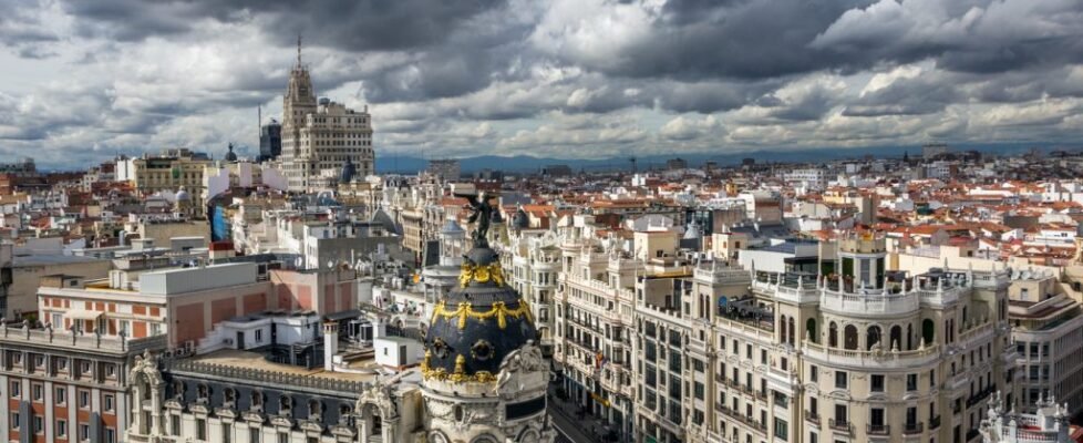 Panoramic view on Gran Via, the main shopping street in Madrid, Spain.