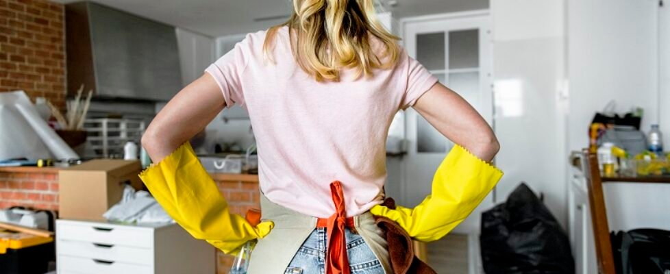 Woman cleaning the house