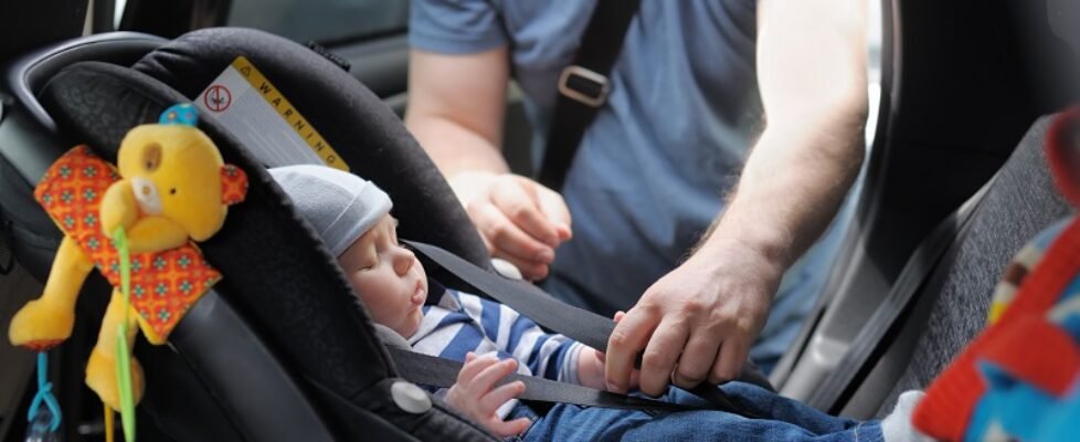 Little boy in car seat