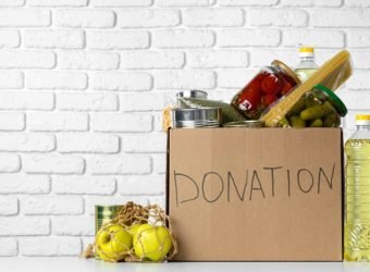 Donation box with various food. Pandemic support.