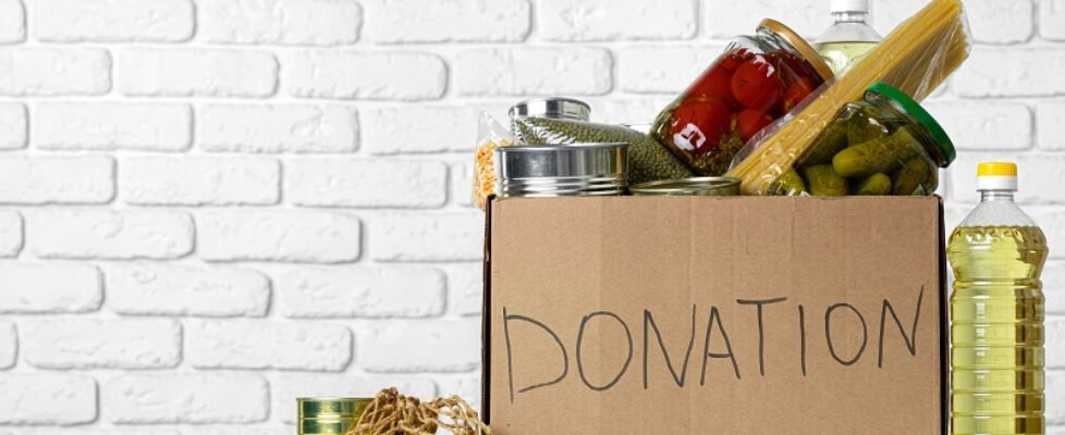 Donation box with various food. Pandemic support.