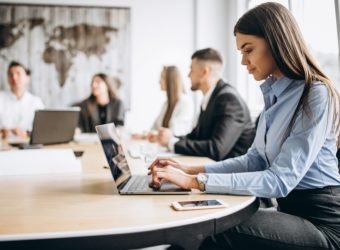 Group of people working out business plan in an office