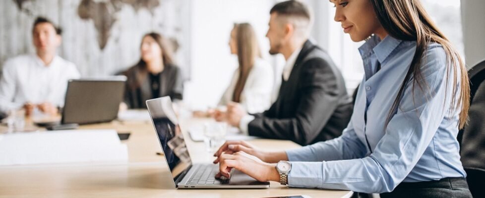 Group of people working out business plan in an office