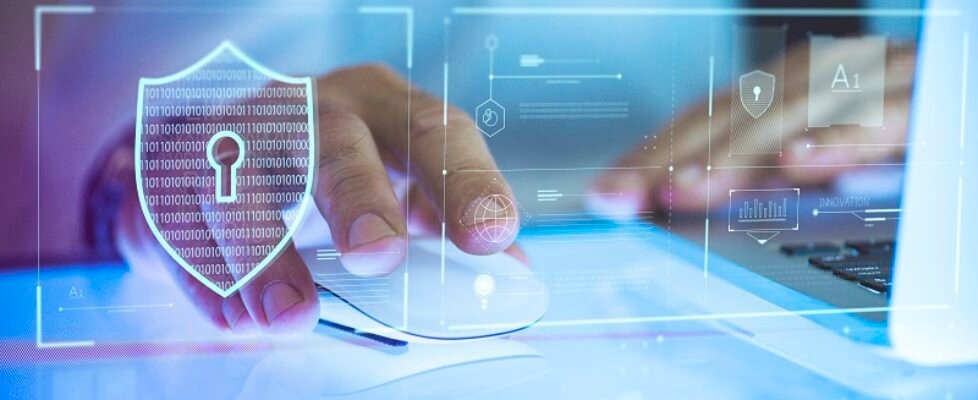 Business person logging in to his laptop