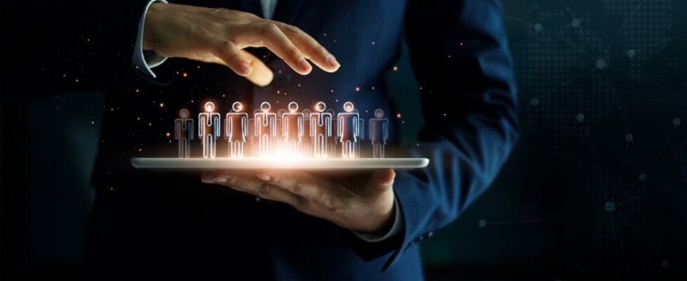 Businessman holding tablet and management group of people in hi