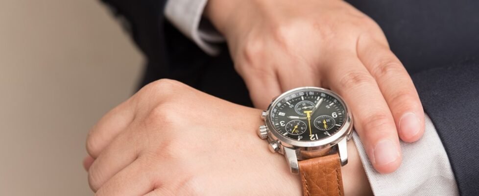 Businessman checking the time