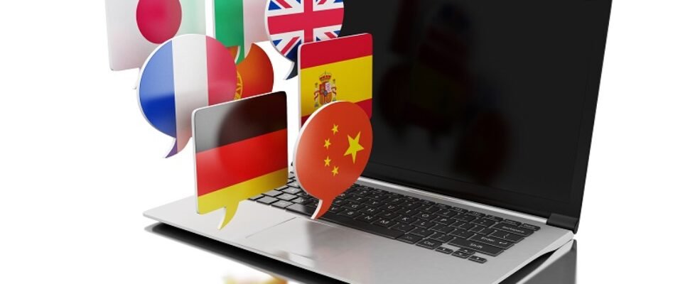 3d Laptop with bubble speech flags.