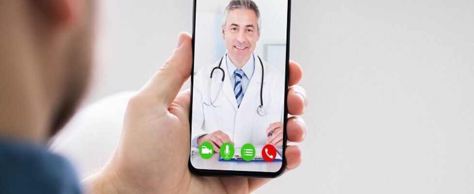 Person Videochatting With Doctor