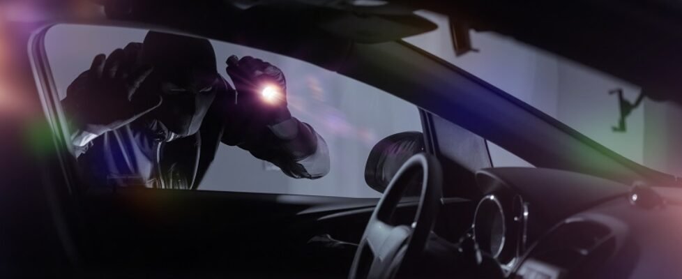 Car Robber with Flashlight