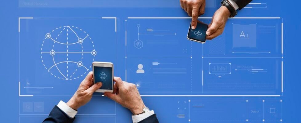 Business people syncing data by mobile phones