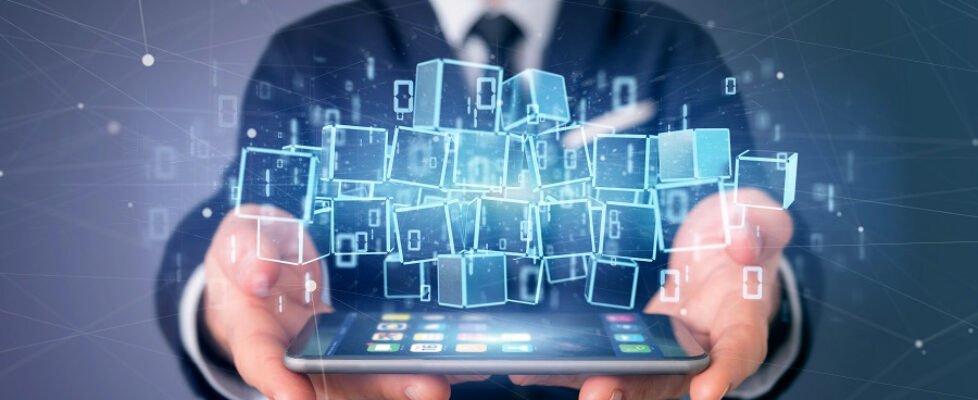 Businessman holding a Cloud of blockchain cube and binary data 3d rendering