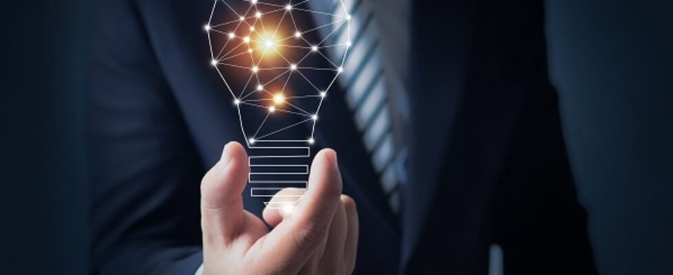 Innovation and creative market concept, business man holding bri