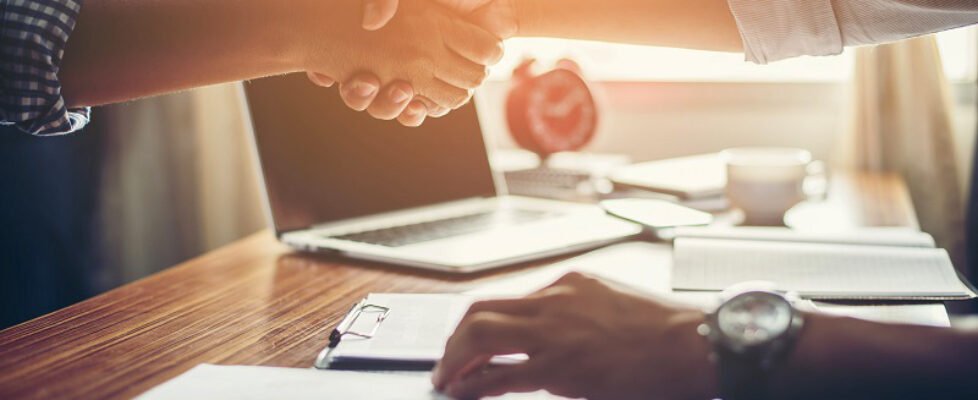 Business People Handshake Greeting Deal at work.