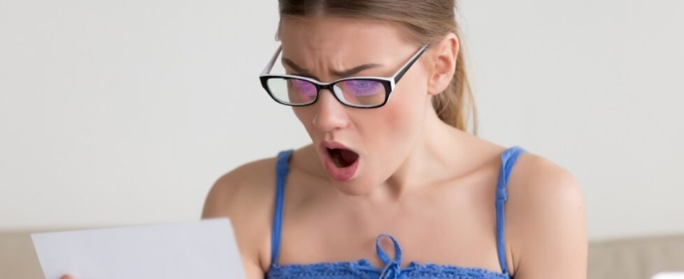 Woman shocked when reading letter with bad news