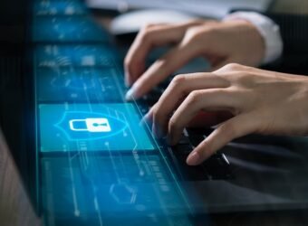 Technology concept with cyber security internet and networking, Businessman hand working on laptop, screen padlock icon on digital display.