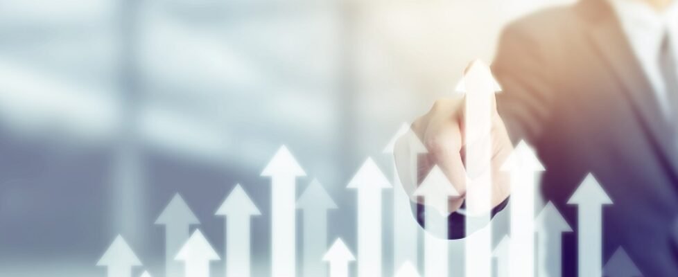 Business development to success and growing growth concept. Businessman pointing arrow graph corporate future growth plan