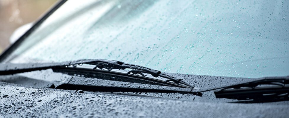Cars parked in the rain in the rainy season and have a wiper sys