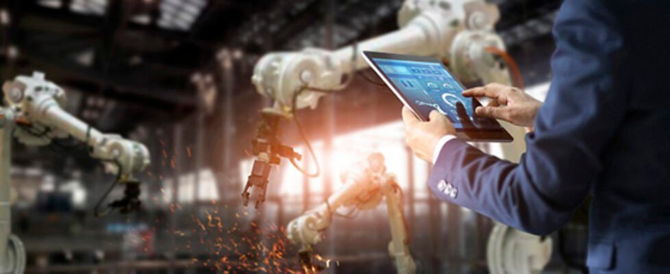 Manager industrial engineer using tablet check and control autom