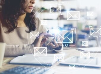 Unrecognizable Asian woman with phone, email