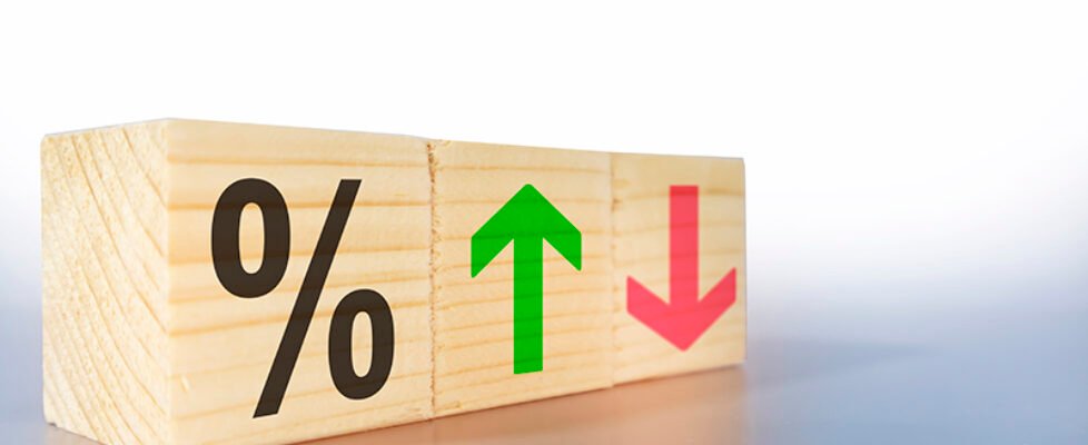 The percentage interest rate goes up or down on a light gray bac