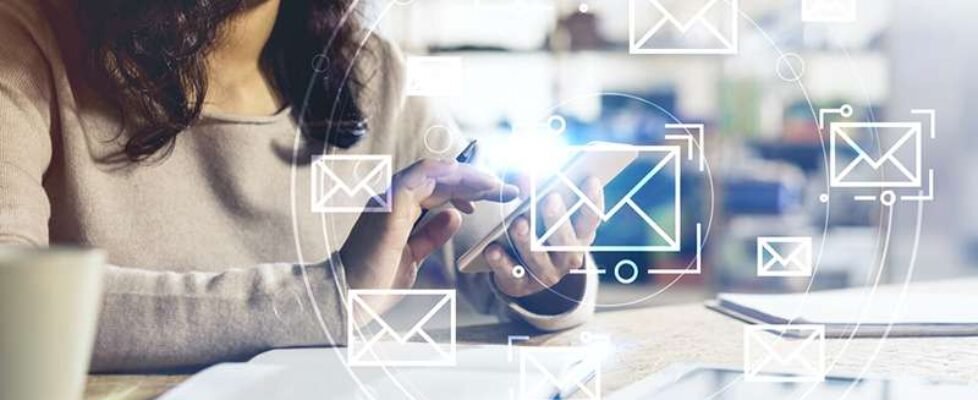 Unrecognizable Asian woman with phone, email