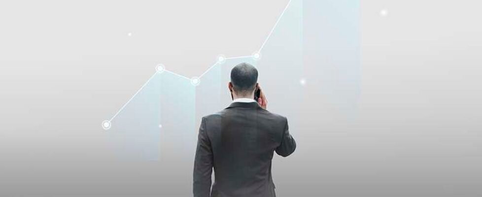 Rear view of a businessman talking on the phone