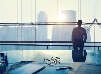 Businessman in a big office