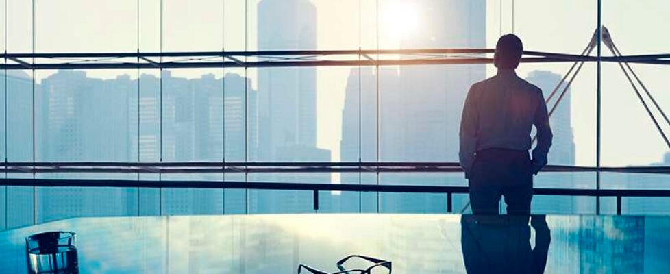 Businessman in a big office