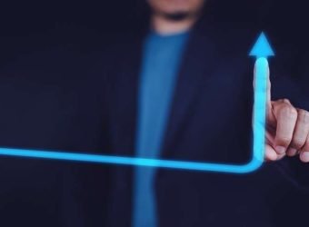 Business growth concept, Businessman pointing arrow graph and ch