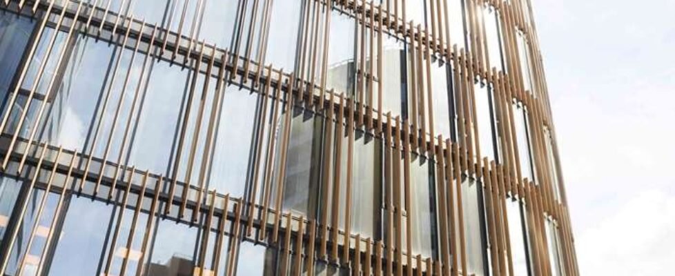 Graphic Glass Building against Sky