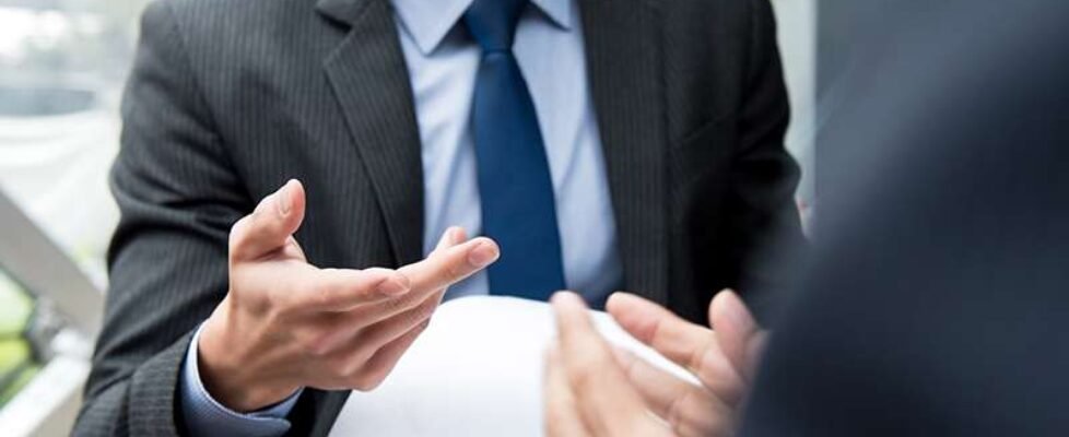 Business partners discussing document at the meeting