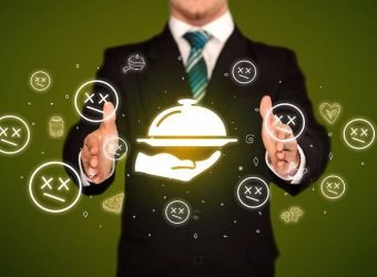 Hand holding food related icons