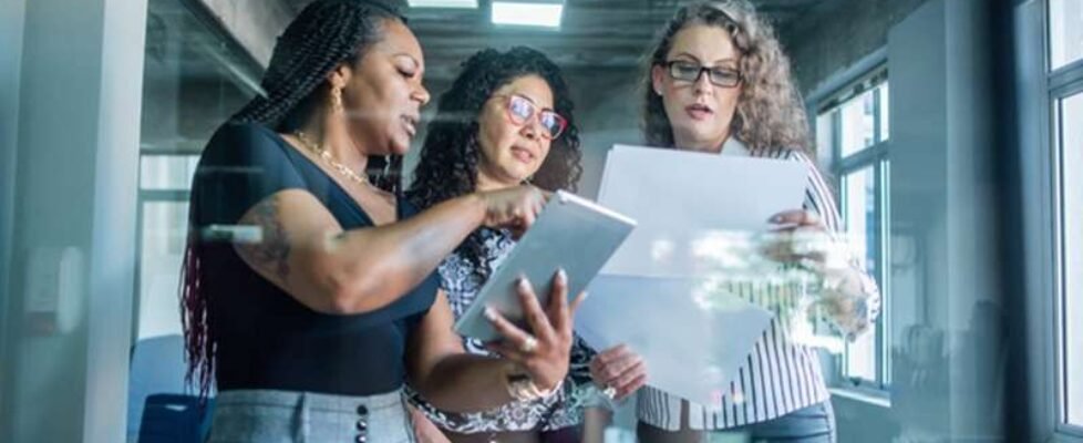 Business meeting of businesswomen in a coworking space