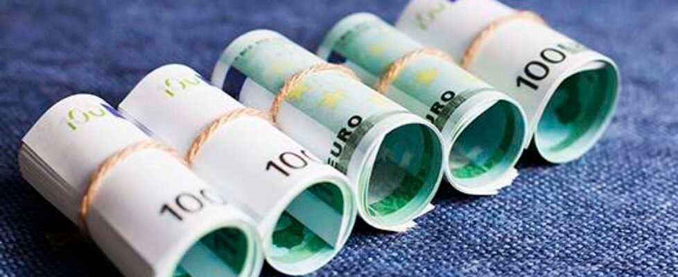 eurocurrency rolls on a blue background