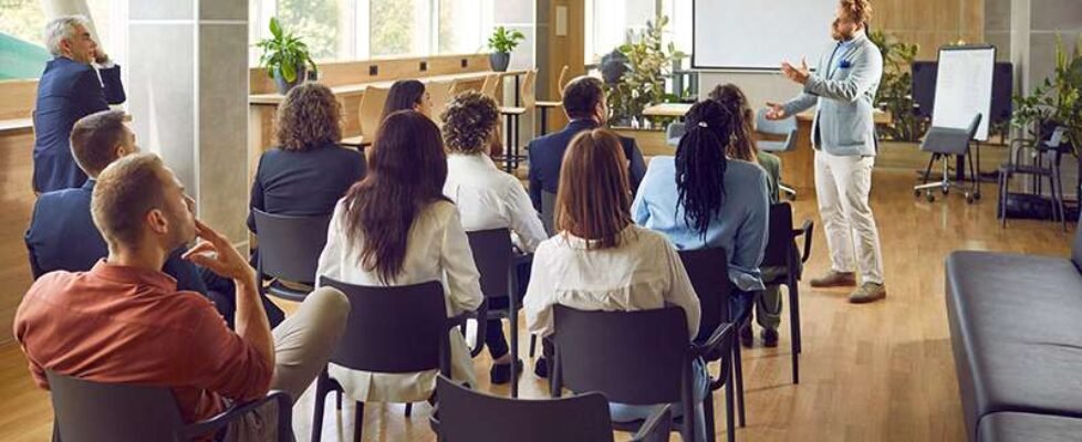 Confident,Business,Man,Speaking,On,A,Work,Meeting,In,The